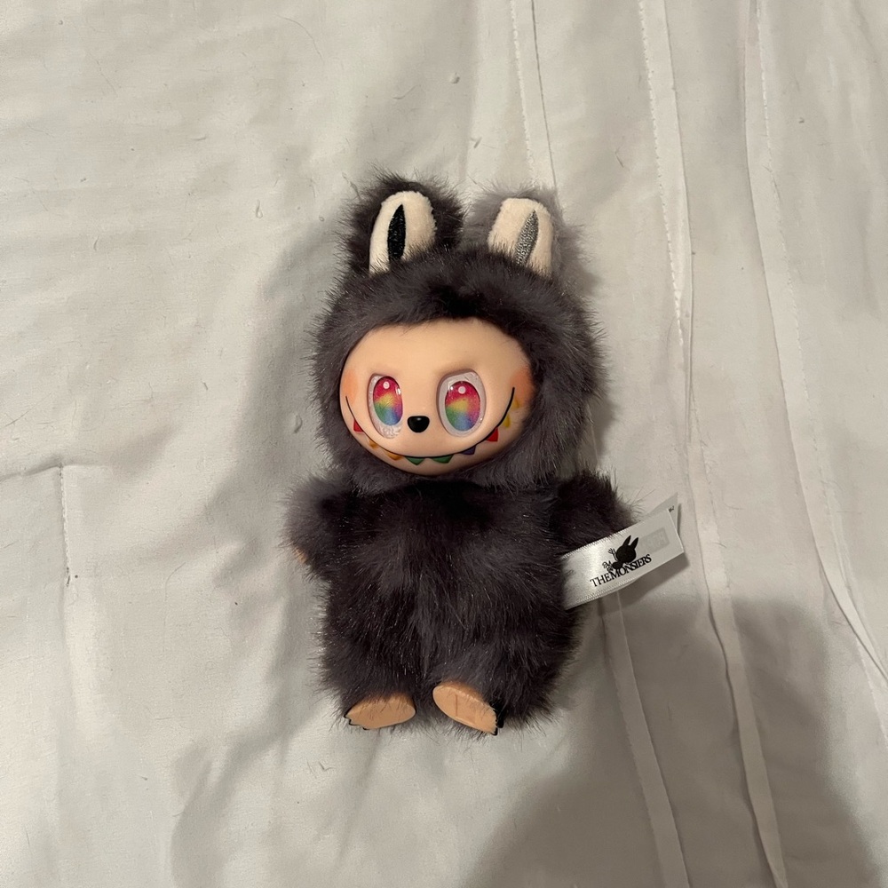 Furry Black Plush Toy with Colorful Eyes